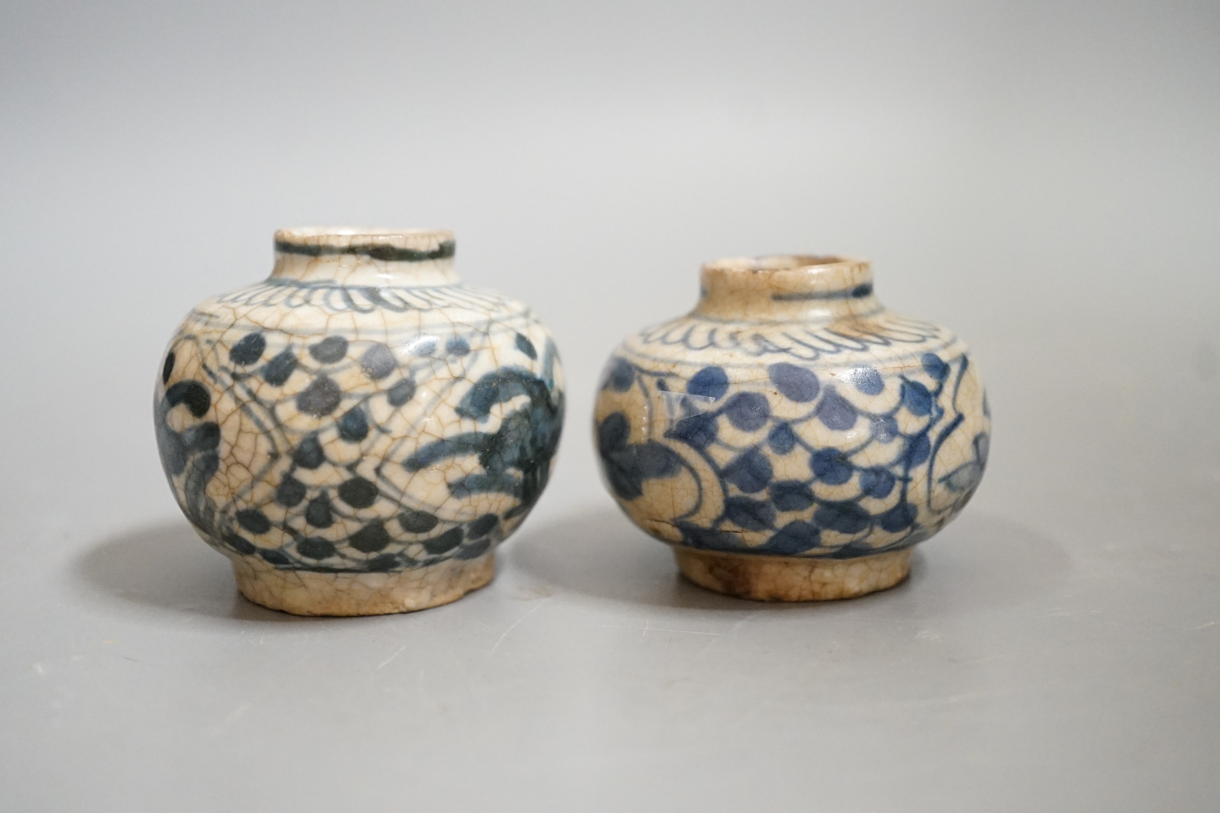 Two Chinese Swatow blue and white jarlets, early 17th century, 5cm tall